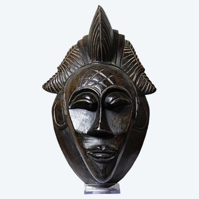 Decorative African wall mask in the Punu Tsangui style, carved wood, 20th century