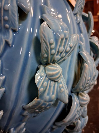 Large baluster-shaped ceramic vase from Maises, glazed in turquoise blue with a floral relief design