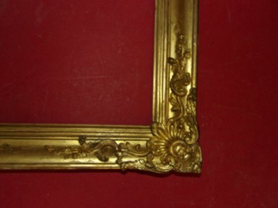 Cornice del XIX secolo in legno dorato.