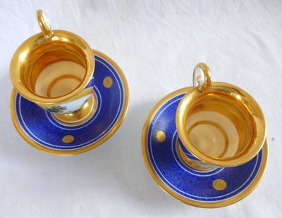 Paire de tasses Empire à paysages et fond bleu d'époque Restauration - porcelaine de Paris