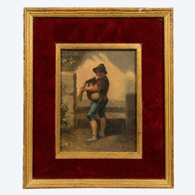 Huile sur panneau représentant un jeune joueur de cornemuse – XIXe siècle