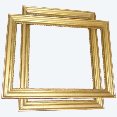 Coppia di cornici del XIX secolo, in legno dorato.