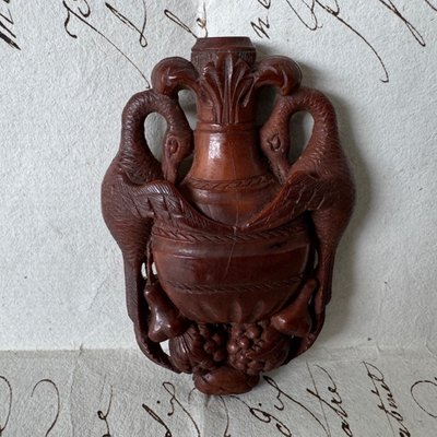 Corozo rocking chair depicting a vase and swans, 19th century