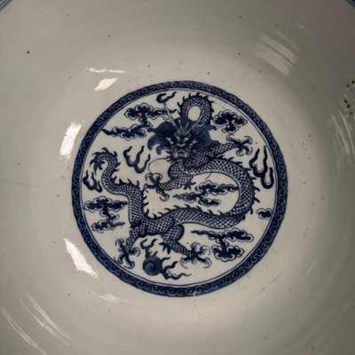 Large blue Chinese porcelain bowl with dragon decoration, 18th century