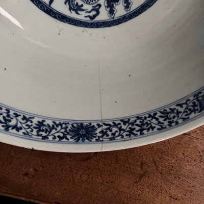 Large blue Chinese porcelain bowl with dragon decoration, 18th century
