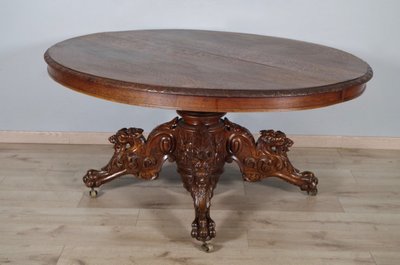 Large Renaissance-style carved oak pedestal table, circa 1900