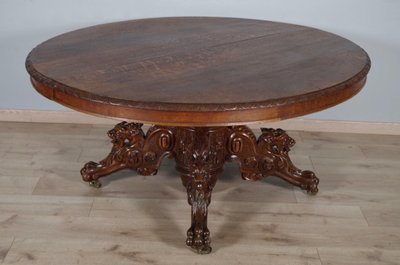 Large Renaissance-style carved oak pedestal table, circa 1900