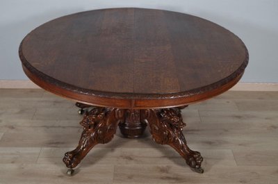 Large Renaissance-style carved oak pedestal table, circa 1900