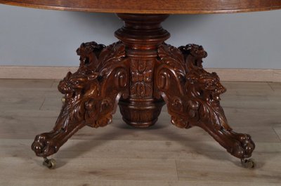 Large Renaissance-style carved oak pedestal table, circa 1900