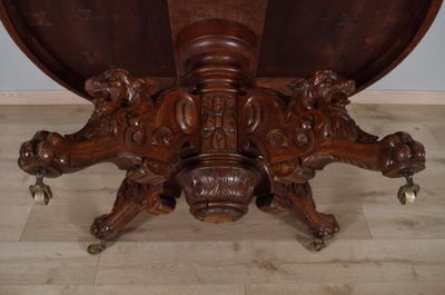 Large Renaissance-style carved oak pedestal table, circa 1900