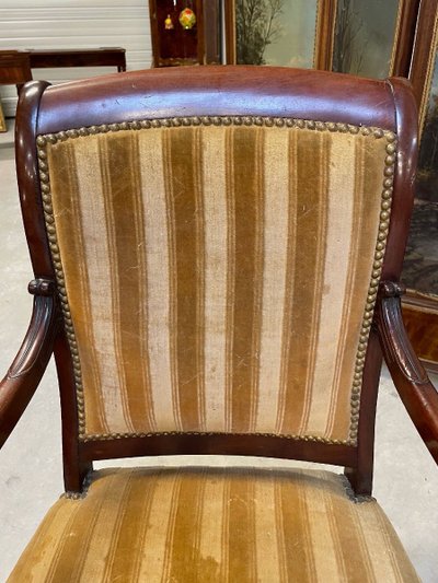 Pair of Restoration-style mahogany armchairs with curved backs, circa 1815