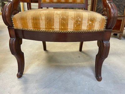 Pair of Restoration-style mahogany armchairs with curved backs, circa 1815