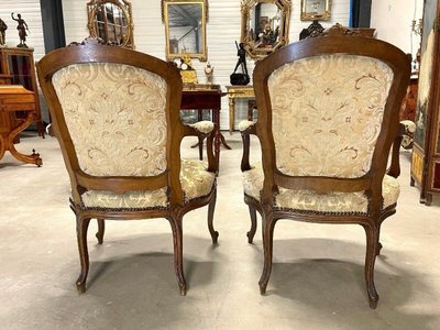 Set of four Louis XV armchairs in carved and gilded walnut, circa 1900