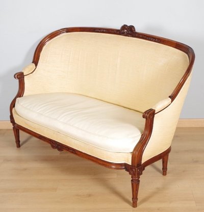 Louis XVI wicker-style sofa in carved walnut, circa 1780