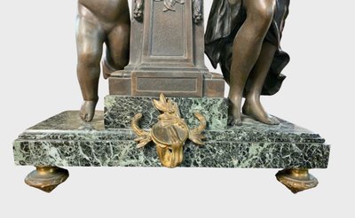 Louis XVI-style clock with a putto and a draped woman, circa 1880