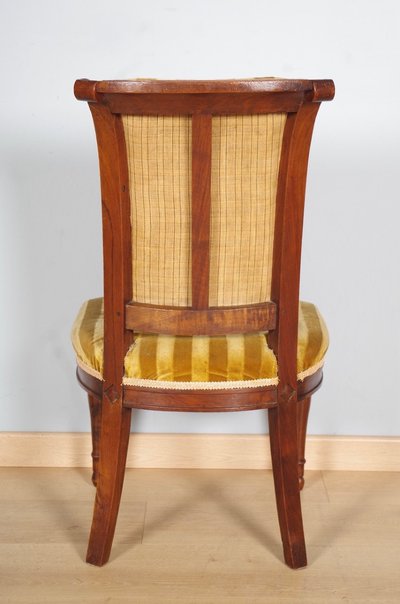 Pair of Directoire-style chairs in carved walnut, circa 1795