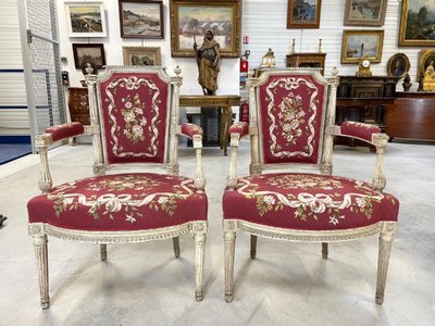 Suite de 4 fauteuils Directoire en bois laqué sculpté, vers 1795