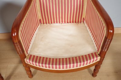 Ein Paar Bergère-Stühle aus geschnitztem Mahagoni aus der Restaurationszeit, um 1815