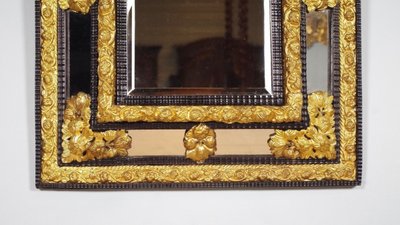 Miroir à parcloses Louis XIV en bois noirci et laiton doré, vers 1860