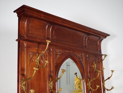 Gothic coat rack with mirror in carved walnut, circa 1900