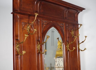 Gothic coat rack with mirror in carved walnut, circa 1900