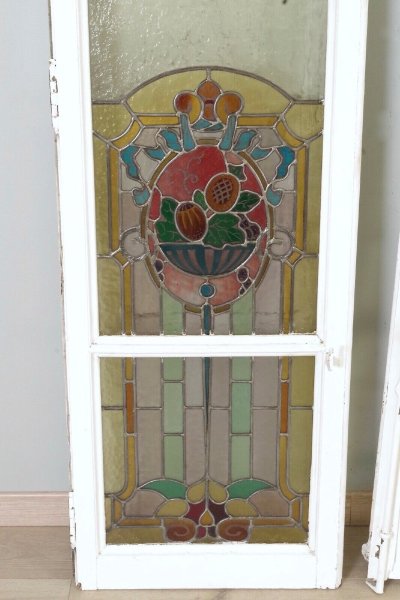 A series of four stained-glass windows signed by Hippolyte Paquier-Sarrasin, Lyon