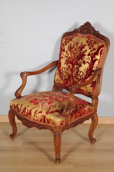 Pair of large Regency armchairs in carved walnut, circa 1900
