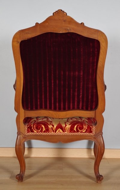 Pair of large Regency armchairs in carved walnut, circa 1900