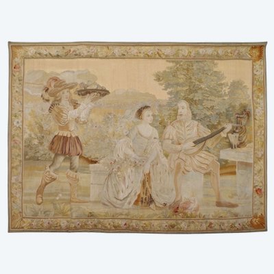 Importante arazzo raffigurante una scena galante, realizzato in lana e seta, nello stile del XVIII secolo.
