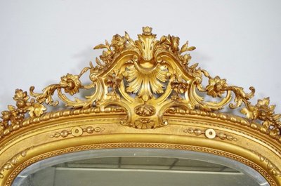 Important miroir Régence en bois et stuc dorés, vers 1880