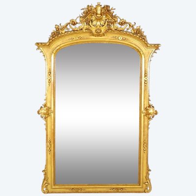 Important miroir Régence en bois et stuc dorés, vers 1880