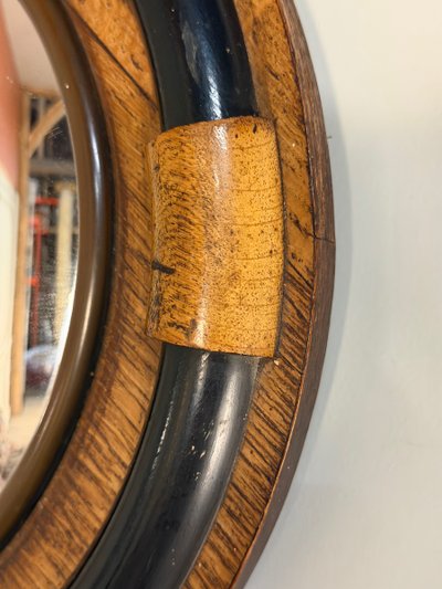 Witch's mirror made of oak and ebony, England, ca. 1920