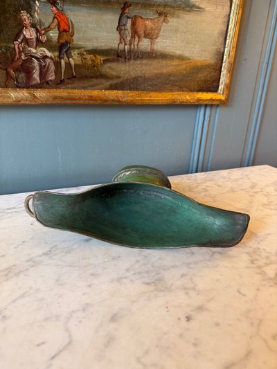 Small painted sheet metal planter with a floral design