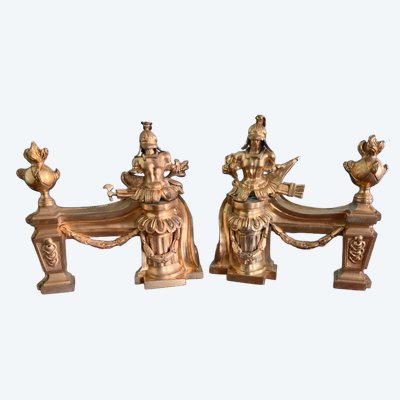 Pair of andiron heads with gilt bronze trophies of arms, Louis XV-Louis XVI transition period