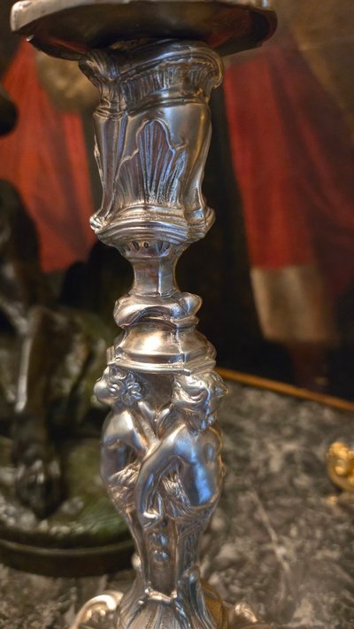 Pair of silvered bronze candlesticks decorated with putti, Napoleon III period, circa 1860-1880