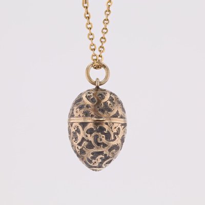 Pendentif œuf ouvrant argent et vermeil