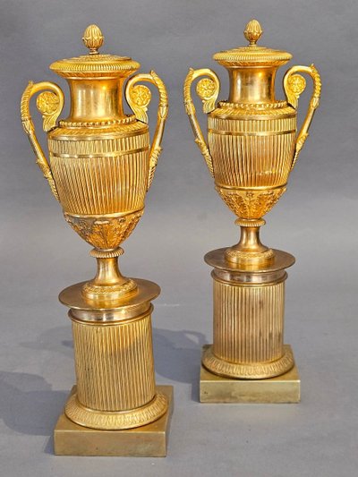 pair of reversible gilded bronze cassolettes/candleholders—Empire period