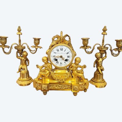 "Aux Putti" ornament in gilded bronze; Marnyhac House in Paris
