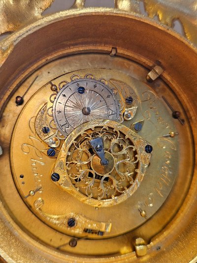 Louis XV-era table clock with a bull motif