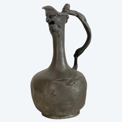 Art Nouveau pewter pitcher signed by Alfred Barye (1839–1905).