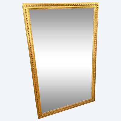 18th-century Louis XVI mirror in gilded wood
