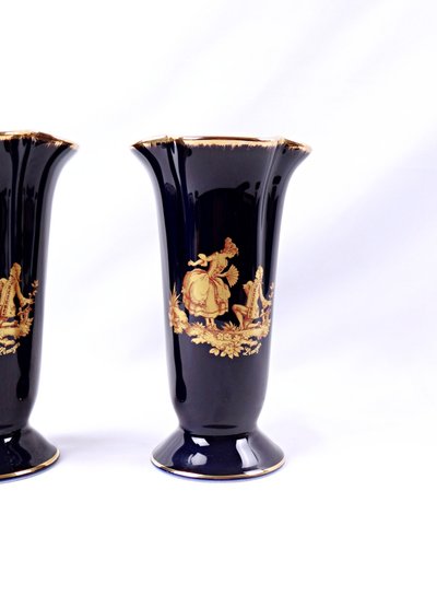 Paire de vases cornet en porcelaine de Limoges signés M P Samie milieu XXe