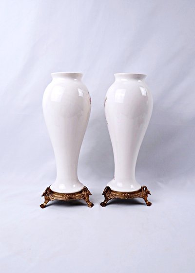 Pair of Limoges porcelain vases with floral decoration and gilded bronze mounts, late 19th century