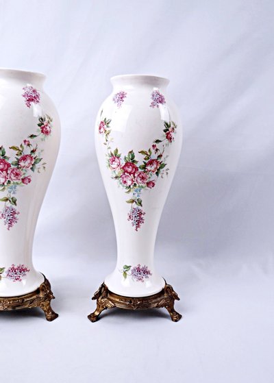 Pair of Limoges porcelain vases with floral decoration and gilded bronze mounts, late 19th century