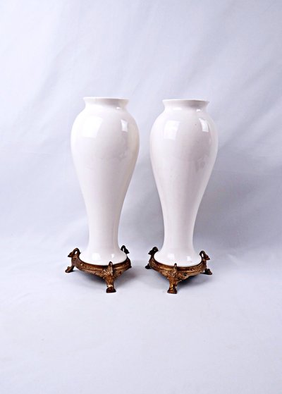 Pair of Limoges porcelain vases with floral decoration and gilded bronze mounts, late 19th century