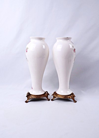 Pair of Limoges porcelain vases with floral decoration and gilded bronze mounts, late 19th century