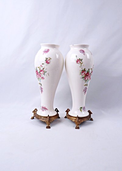 Pair of Limoges porcelain vases with floral decoration and gilded bronze mounts, late 19th century