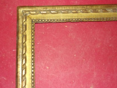18th-century Louis XVI giltwood frame.