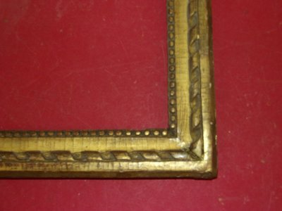 18th-century Louis XVI giltwood frame.