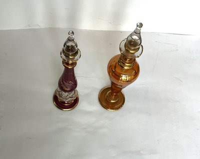 Two 19th-century perfume bottles.